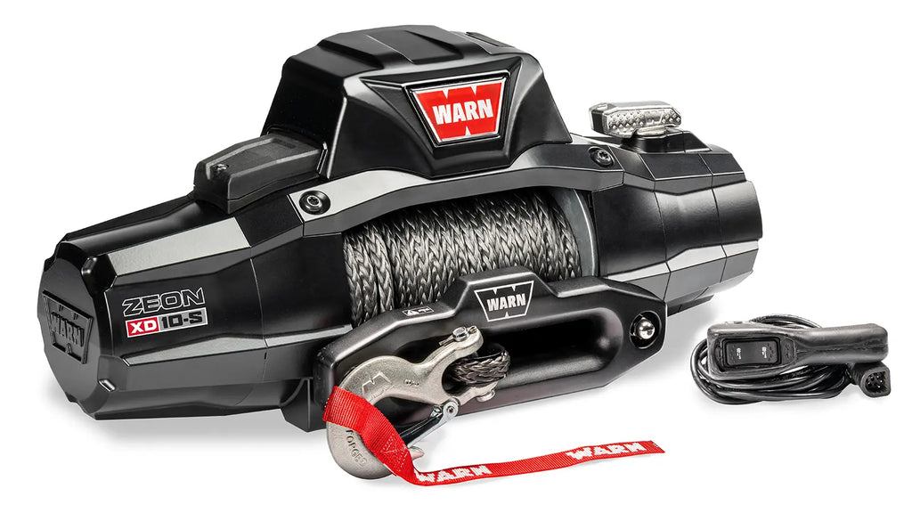 Angled view of the WARN ZEON XD 10-S 10,000 lb truck, Jeep, and SUV winch with 100 ft synthetic rope and hawse fairlead