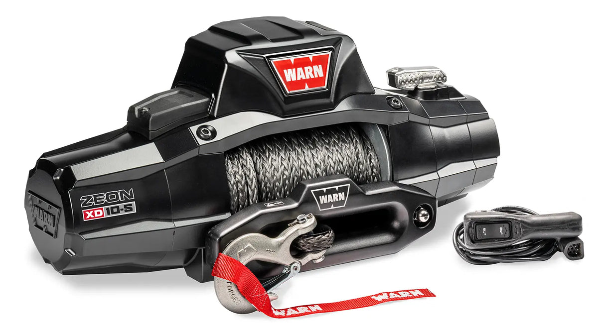 Angled view of the WARN ZEON XD 10-S 10,000 lb truck, Jeep, and SUV winch with 100 ft synthetic rope and hawse fairlead