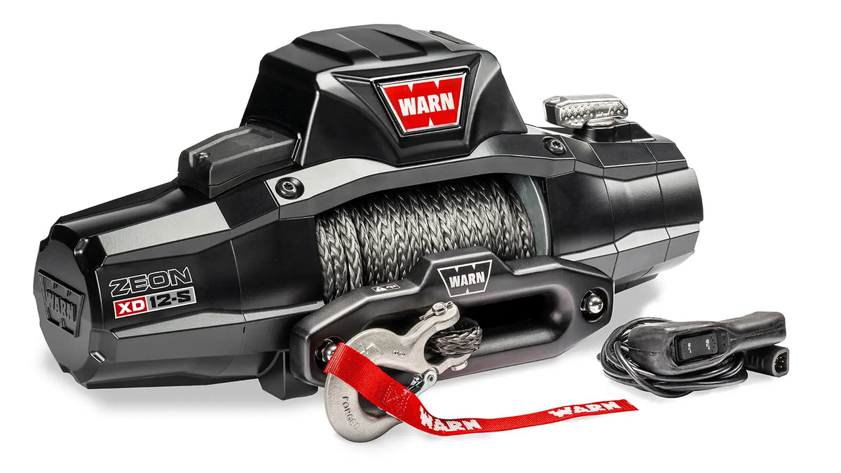 Angled view of the WARN ZEON XD 12-S 12,000 lb truck, Jeep, and SUV winch with 80 ft synthetic rope and hawse fairlead