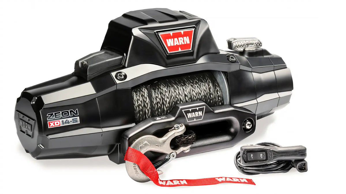 Angled view of the WARN ZEON XD 14-S 14,000 lb truck, Jeep, and SUV winch with 80 ft synthetic rope and hawse fairlead