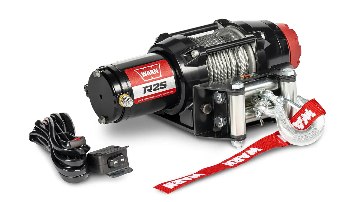Angled view of the WARN R25 2,500 lb ATV/UTV winch with 50 ft steel rope and roller fairlead