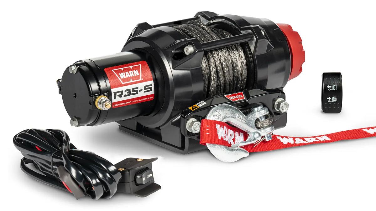 Angled view of the WARN R35-S 3,500 lb ATV/UTV winch with 50 ft synthetic rope and hawse fairlead
