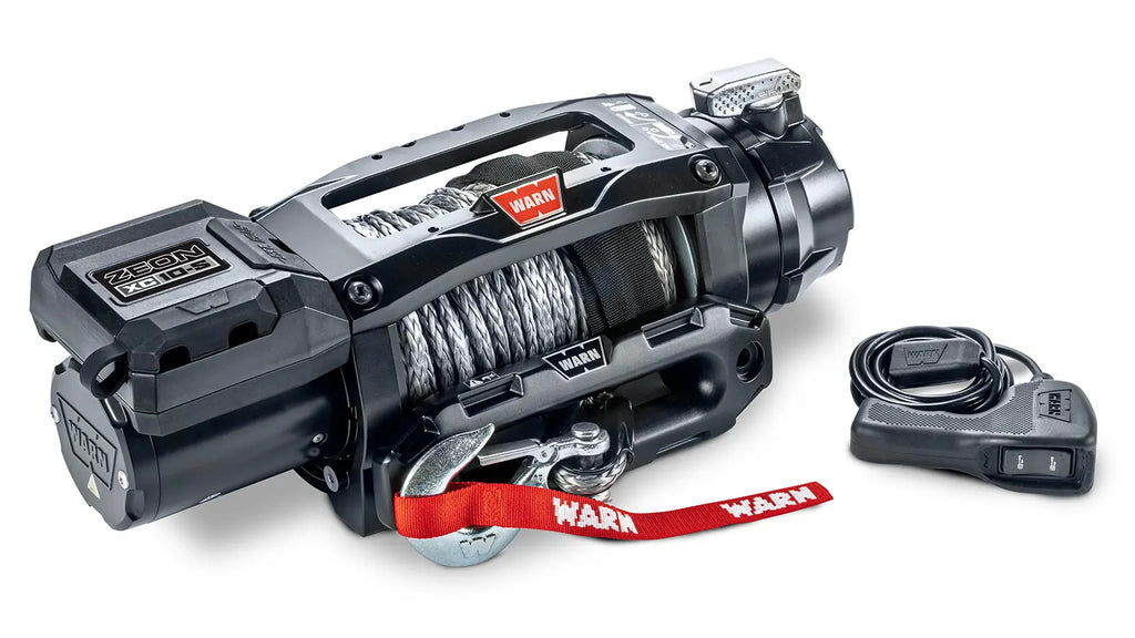 Angled view of the WARN ZEON XC 10-S 10,000 lb truck, Jeep, and SUV winch with 100 ft synthetic rope and hawse fairlead