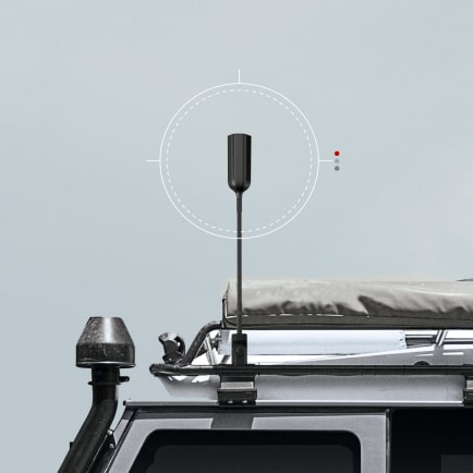 weBoost Overland antenna mounted on a vehicle roof rack
