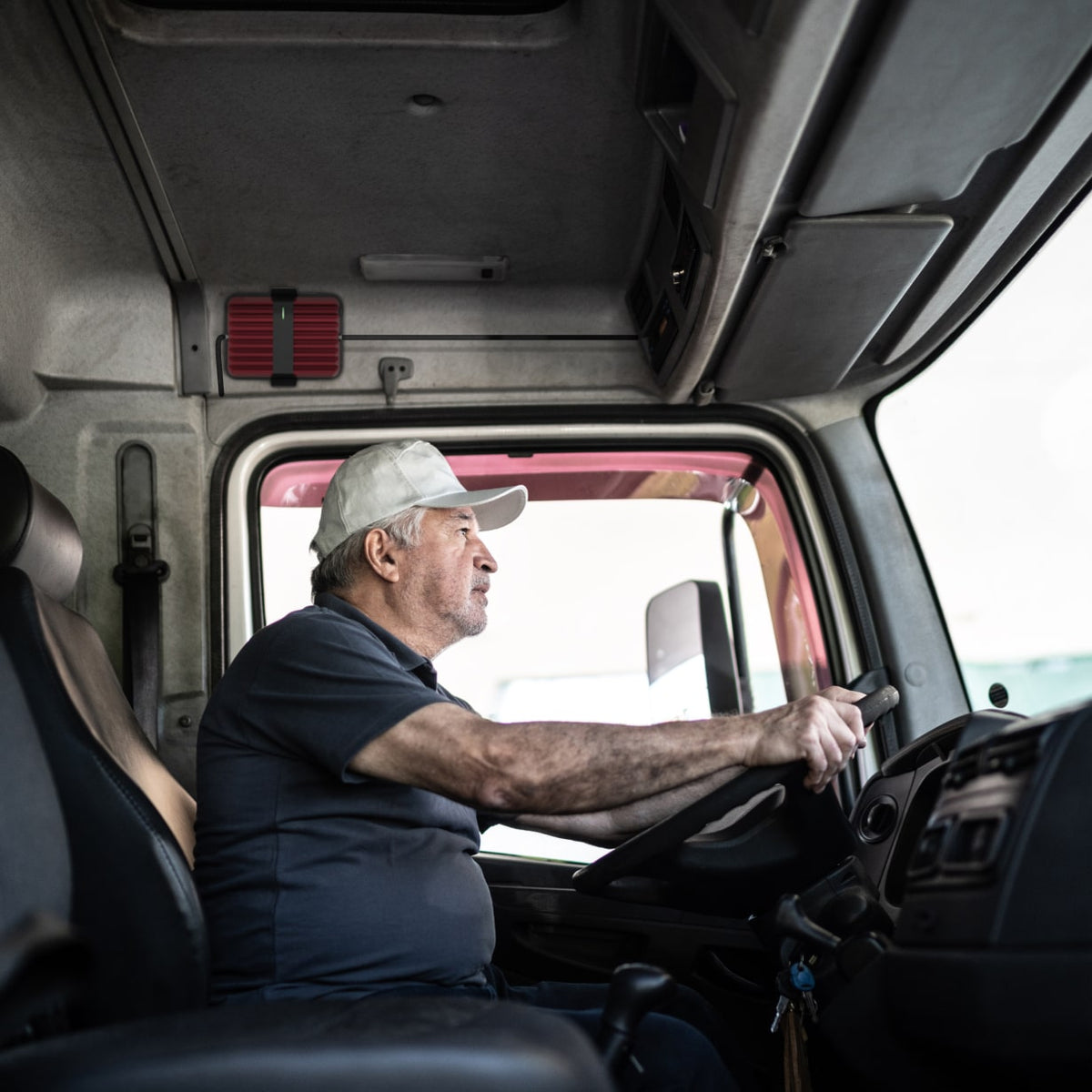 weBoost Drive Reach OTR - man in his truck